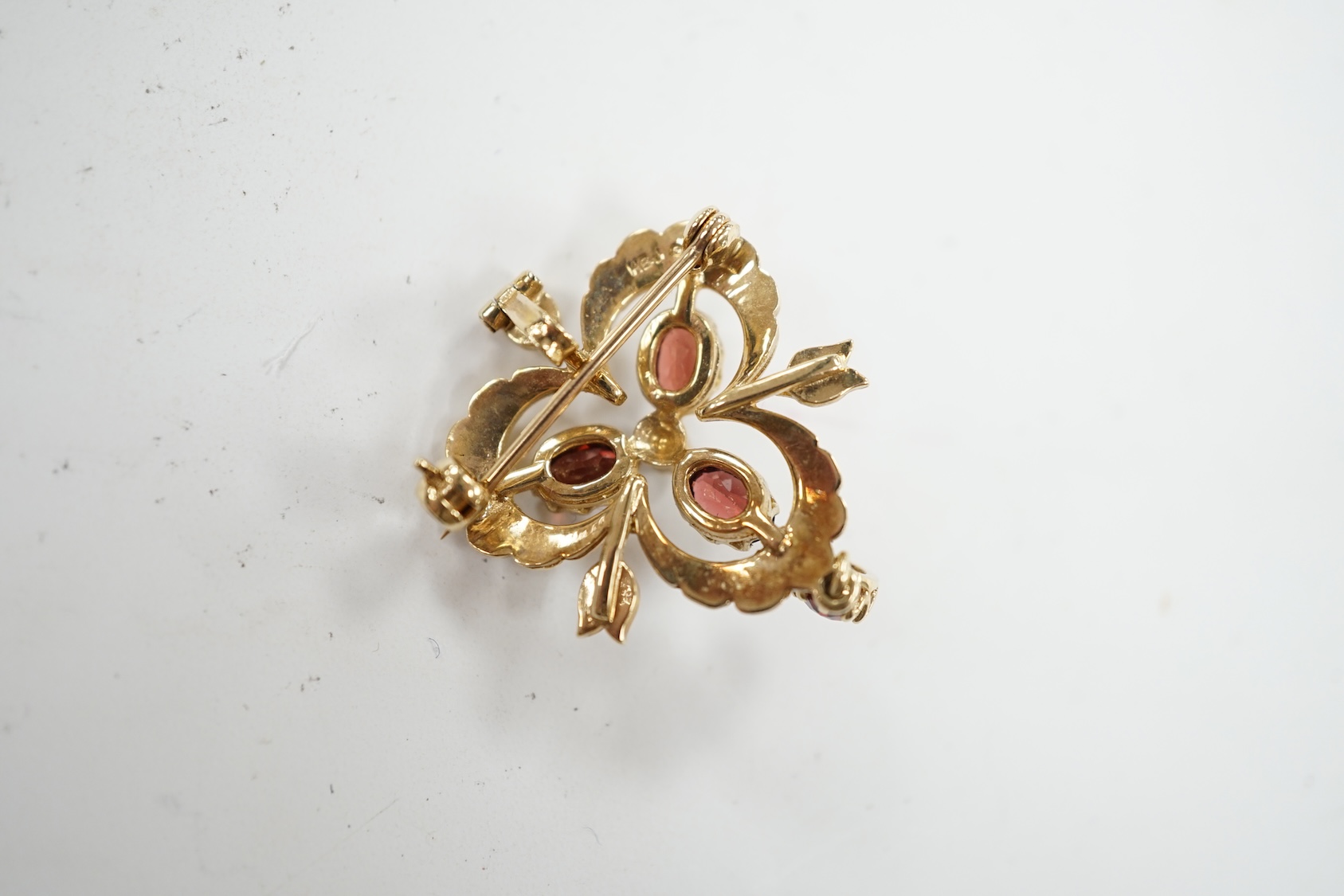 A Victorian style 9ct gold, garnet and seed pearl set drop pendant brooch, overall 39mm, gross weight 5.7 grams. Condition - fair to good